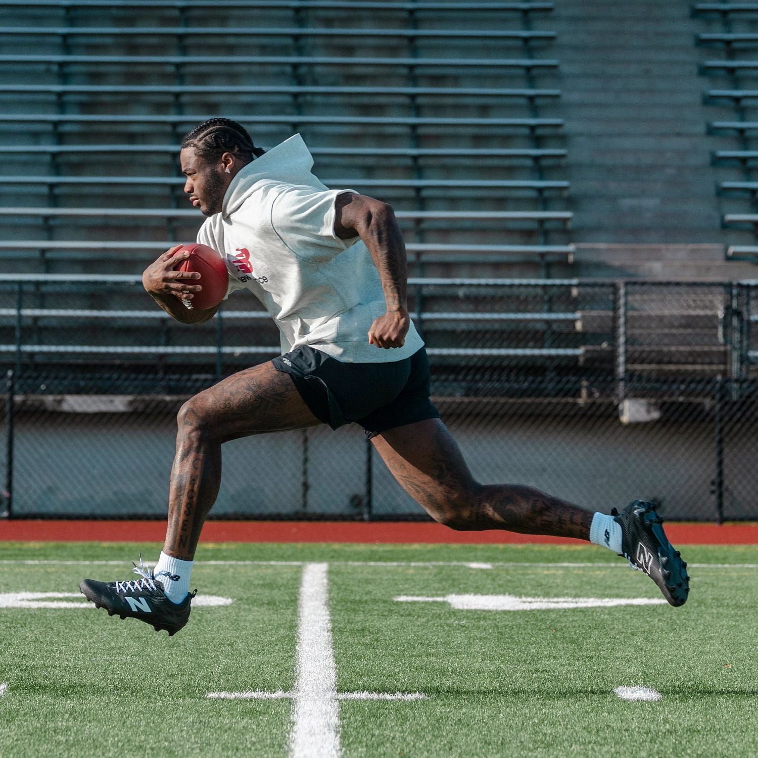 New Balance Adult Rev iQ Football Cleats